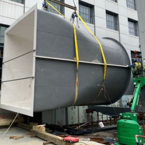 Men working on a wind tunnel